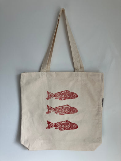 Handprinted linocut tote bag with Fish